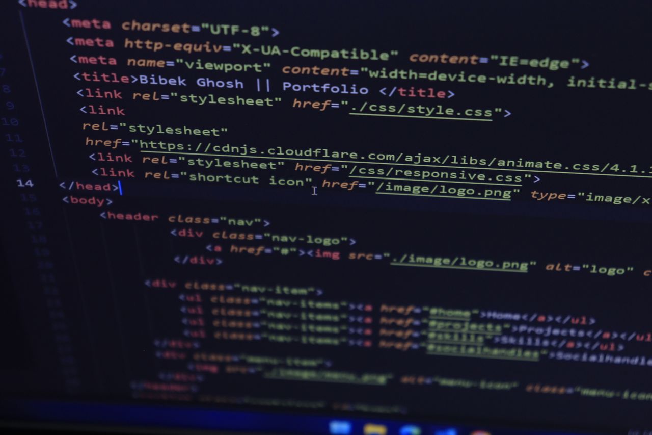 ours-journey Close-up of HTML and CSS code displayed on a computer screen, ideal for tech and programming themes.