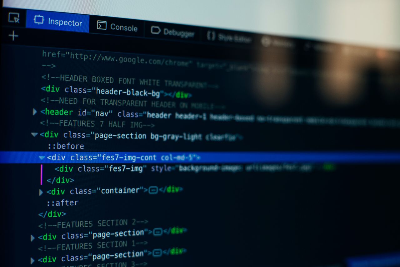 services-03 Detailed view of HTML code on a computer screen, ideal for tech and software development themes.
